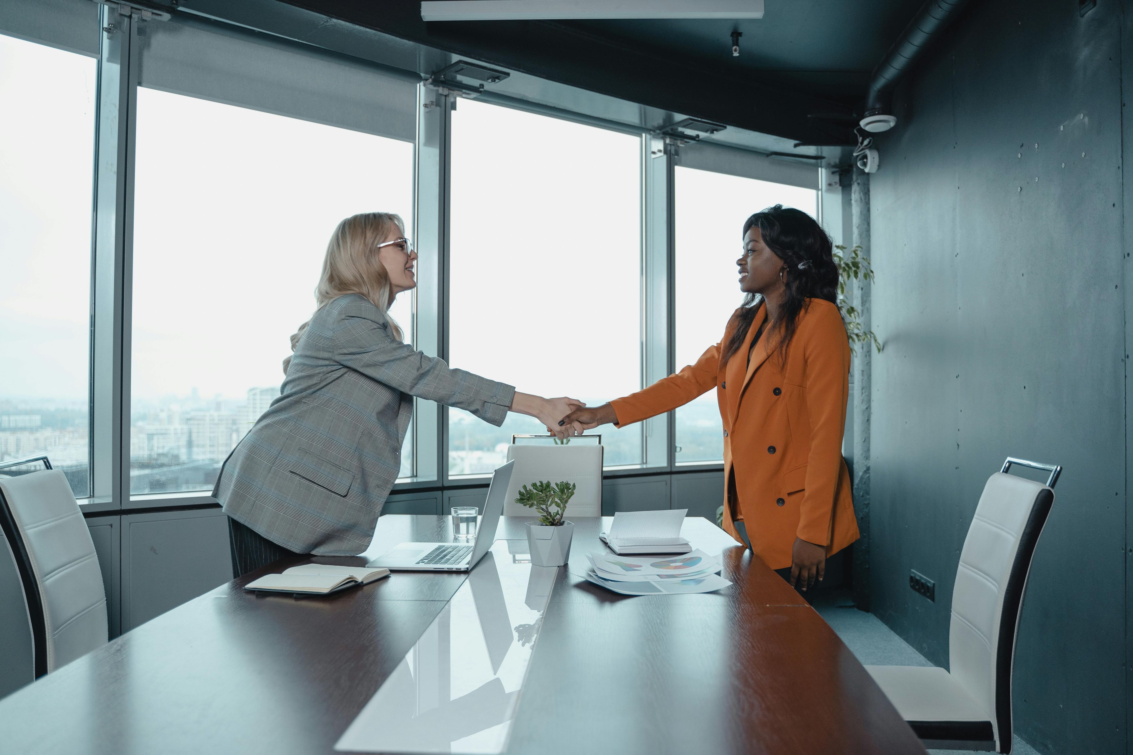 ladies shake hands 